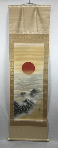 Sun with mountains